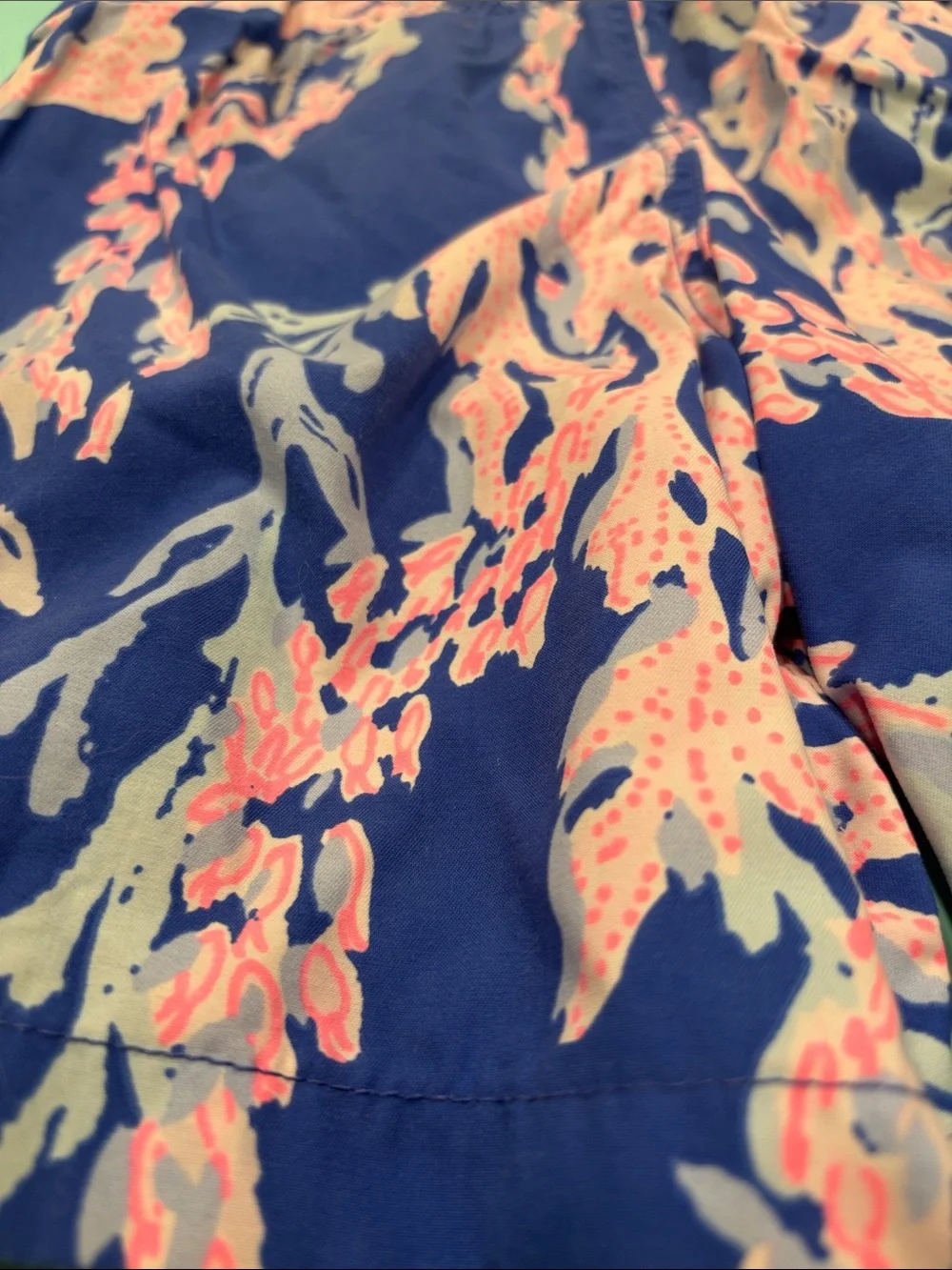 Lilly Pulitzer Blue Swim Trunks with Pink Coral Motif